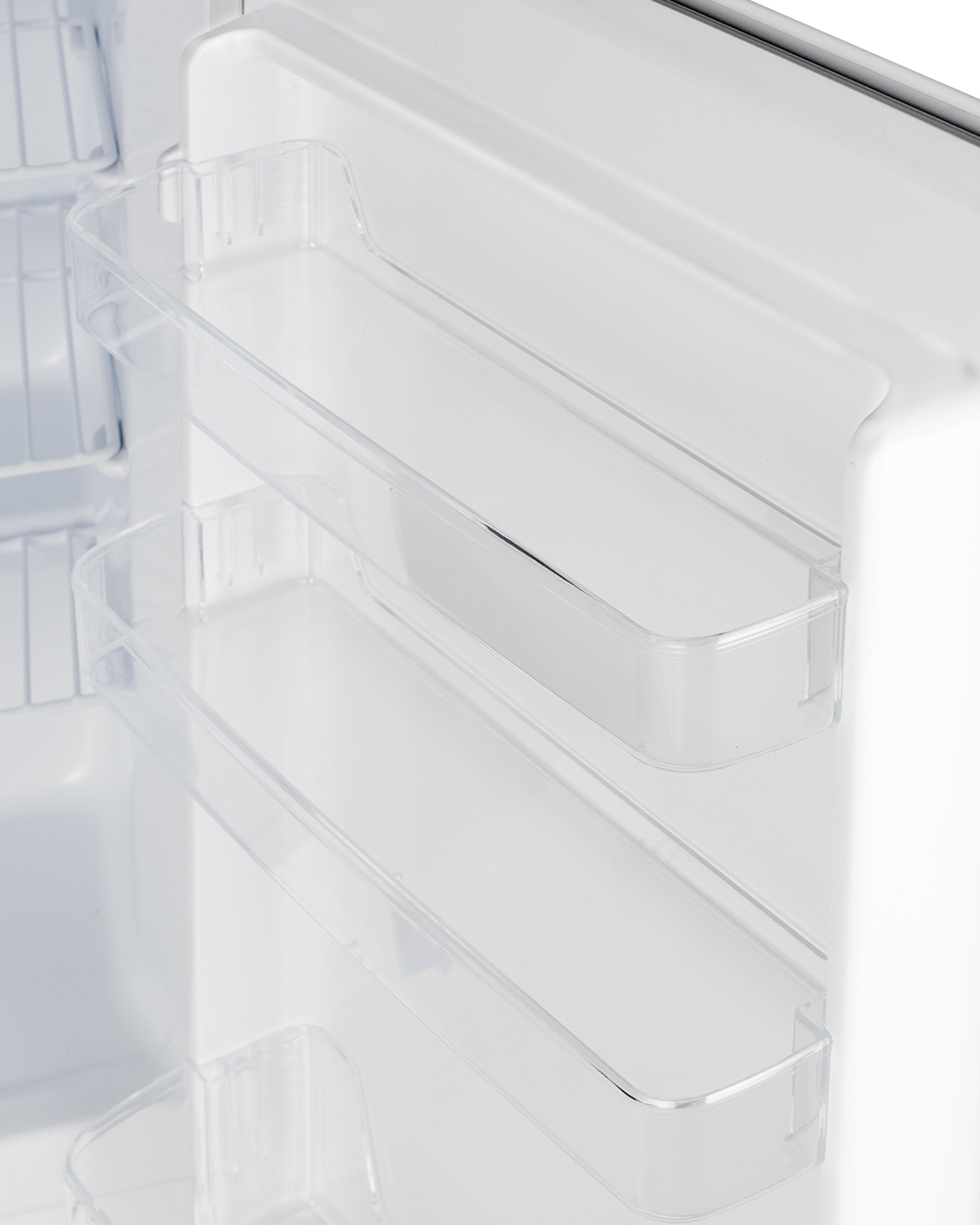Built-in undercounter MOMCUBE residential all-freezer in white with door storage and manual defrost operation, ADA compliant